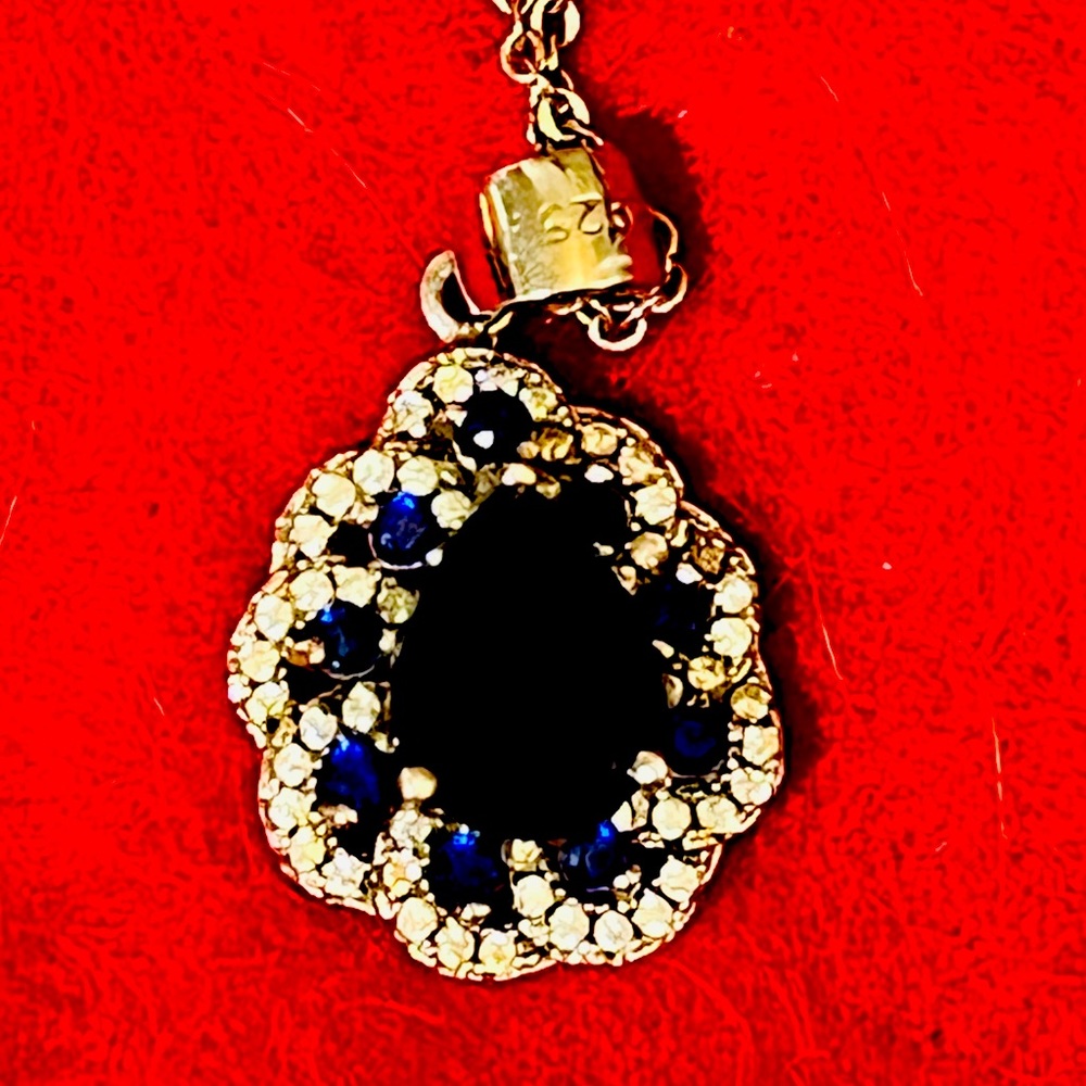 Beautiful Diana tribute charm. I believe it’s factory made Sapphires.